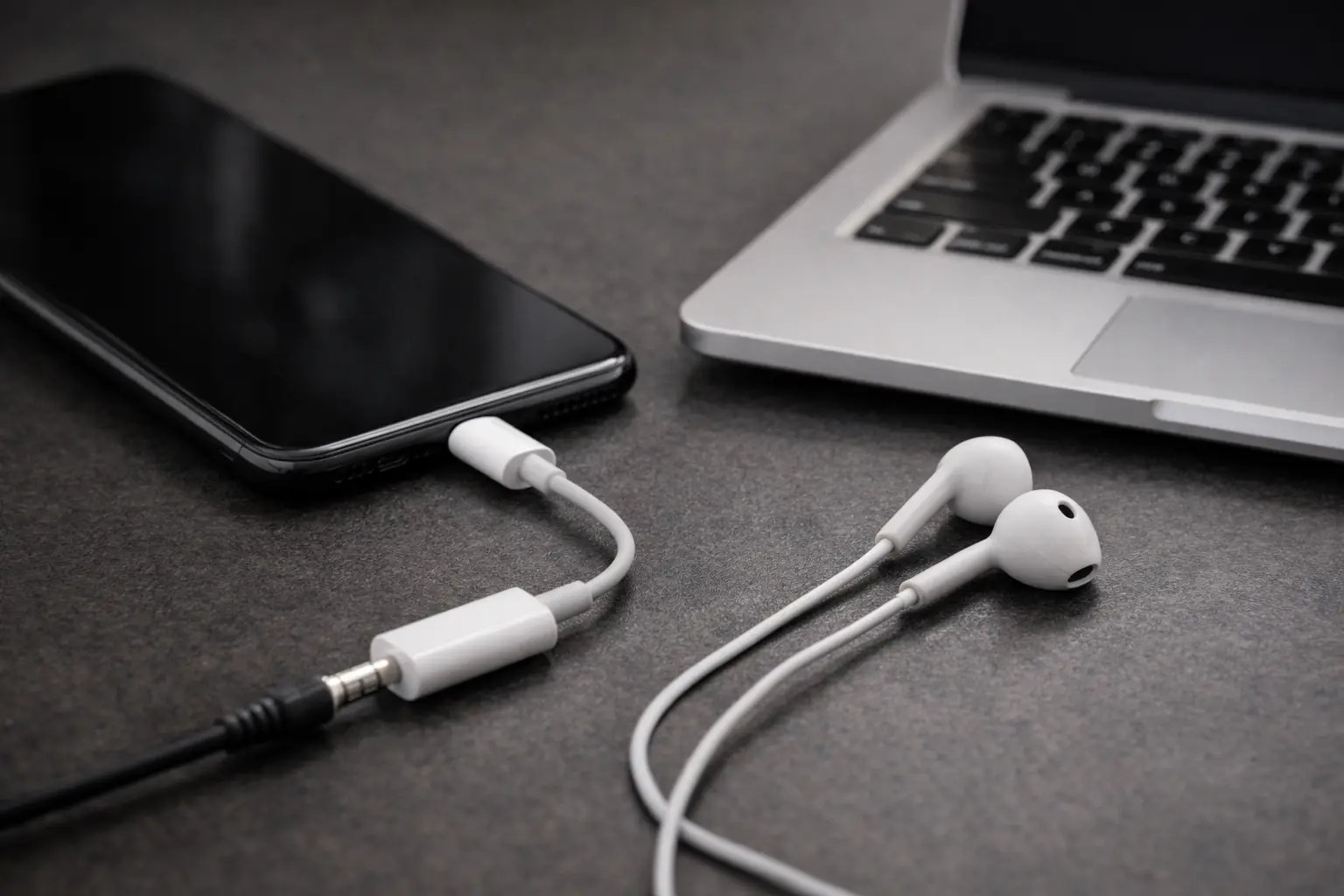 “Smartphone using a USB-C to 3.5mm audio dongle with wired earphones”.png